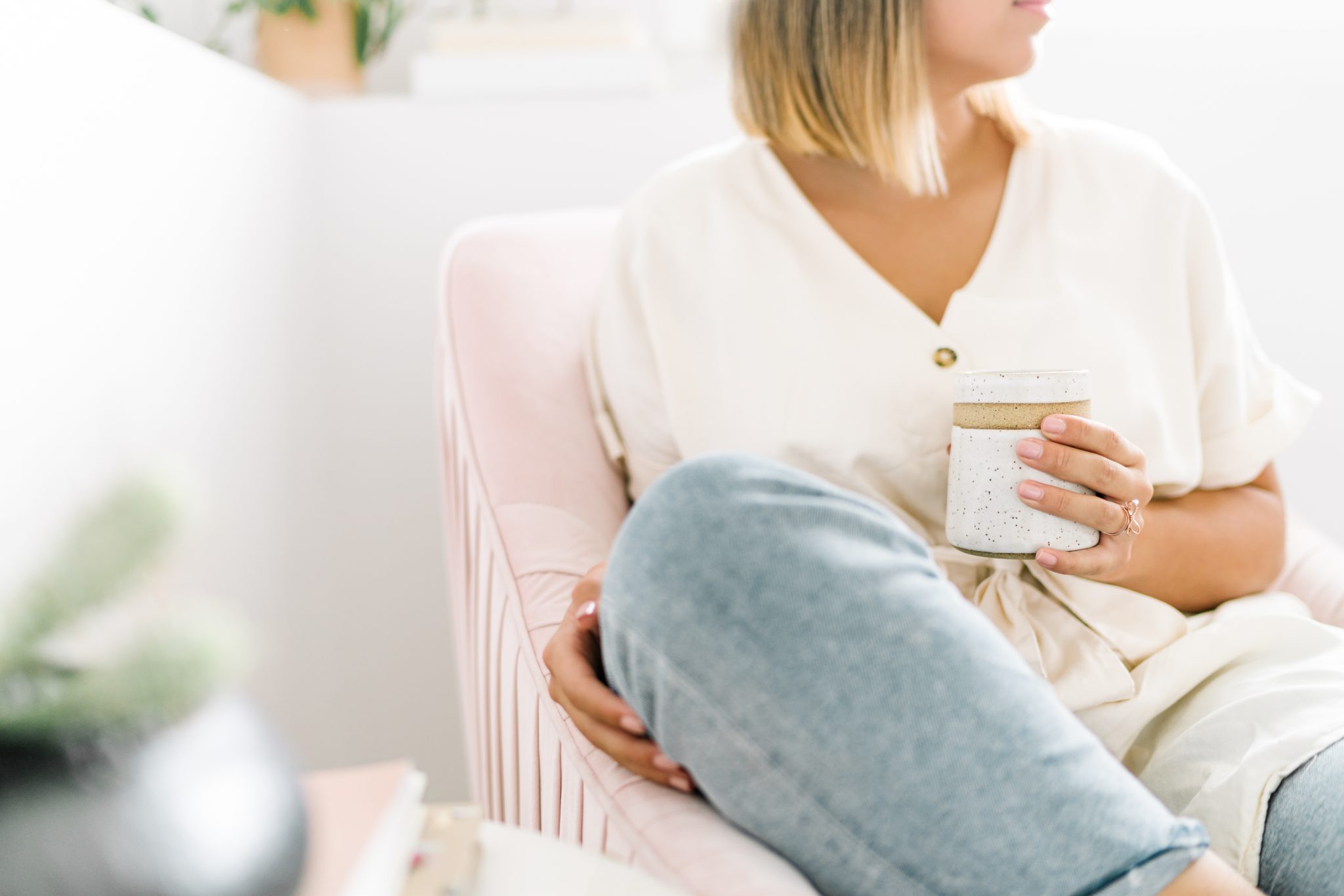 woman sitting and drinking coffee